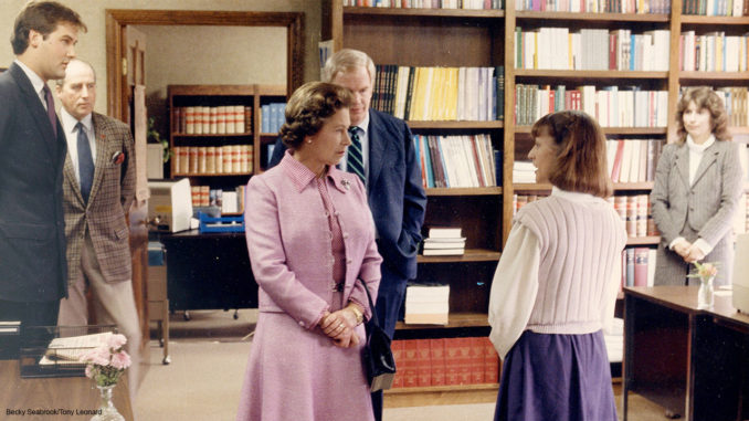 Queen Elizabeth II visits Brisnet offices during her 1984 visit to Lexington, KY.