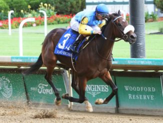 Sandstone winning the Rags to Riches S. at Churchill Downs - Coady Photography