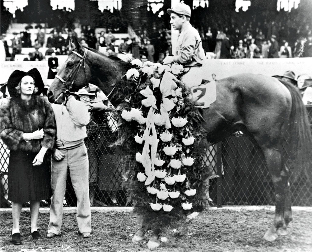 Challedon, with Jockey George Seabo, win the 1939 Preakness