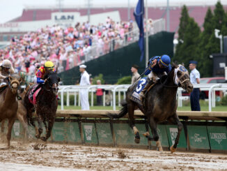First Mission winning the Alysheba (G2) at Churchill Downs (Photo by Horsephotos.com)